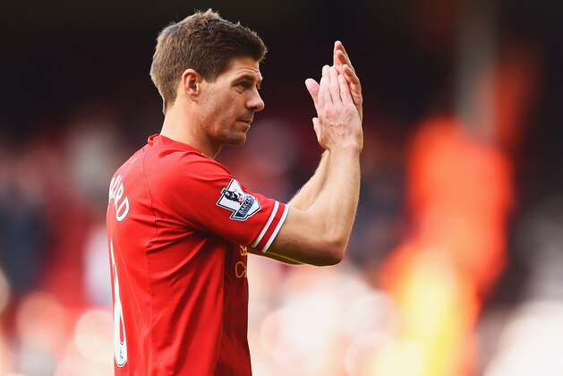 LIVERPOOL, ENGLAND - MAY 11:  Steven Gerrard of Liverpool applauds the crowd after the Barclays Premier League match between Liverpool and Newcastle United at Anfield on May 11, 2014 in Liverpool, England. Liverpool finish as runners-up in the Premier League.  (Photo by Laurence Griffiths/Getty Images)
