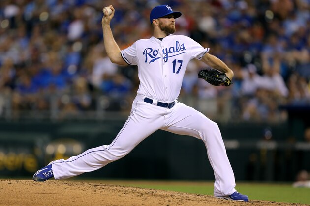 KANSAS CITY, MO - July 24:  Wade Davis #17 of the Kansas City Royals throws in the eighth inning against the Cleveland Indians at Kauffman Stadium on July 24, 2014 in Kansas City, Missouri. (Photo by Ed Zurga/Getty Images)