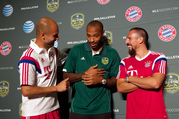Aug 4, 2014; Portland, OR, USA; Bayern Munich manager Josep Guardiola (left) and player Franck Ribery (right) joke around with MLS All Star player Thierry Henry during a press conference in advance of the 2014 MLS All Star Game at The Nines Hotel. Mandatory Credit: Jaime Valdez-USA TODAY Sports