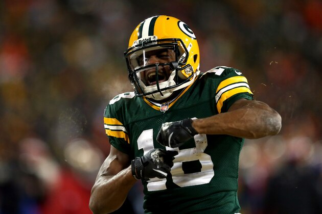 GREEN BAY, WI - JANUARY 05:  Randall Cobb #18 of the Green Bay Packers celebrates after a first down catch in the fourth quarter against the San Francisco 49ers during their NFC Wild Card Playoff game at Lambeau Field on January 5, 2014 in Green Bay, Wisconsin.  (Photo by Jonathan Daniel/Getty Images)