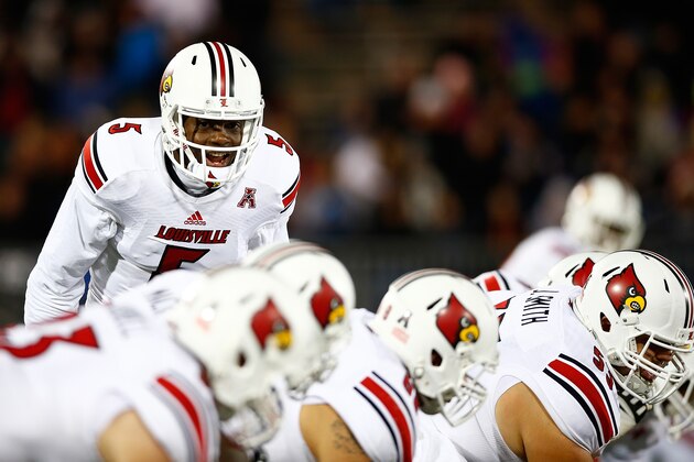 EAST HARTFORD, CT - NOVEMBER 08:  Teddy Bridgewater #5 of the Louisville Cardinals yells to his lineman against the Connecticut Huskies at Rentschler Field in the first quarter during the game on November 8, 2013 in East Hartford, Connecticut.  (Photo by Jared Wickerham/Getty Images)