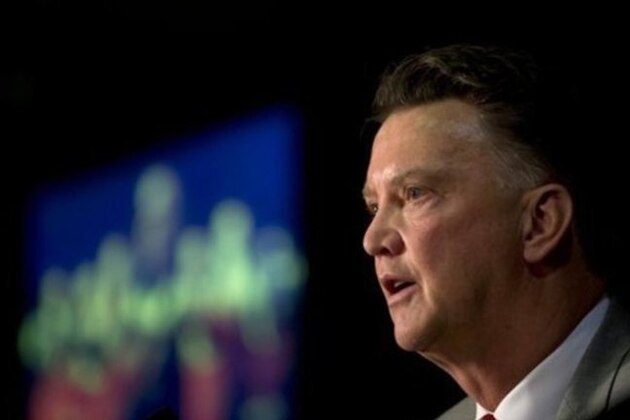 Manchester United's new manager Louis van Gaal speaks during a press conference at Old Trafford Stadium, Manchester, England, Thursday July 17, 2014. The new manager takes over after recently guiding Holland to third pace at the 2014 World Cup. (AP Photo/Jon Super)