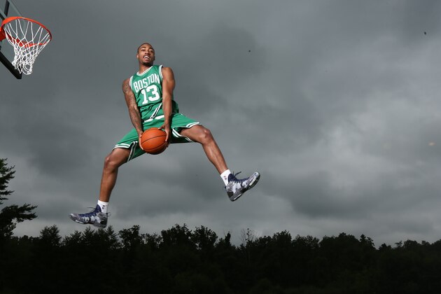 TARRYTOWN, NY - AUGUST 3: James Young #13 of the Boston Celtics poses for a portrait during the 2014 NBA rookie photo shoot on August 3, 2014 at the Madison Square Garden Training Facility in Tarrytown, New York. NOTE TO USER: User expressly acknowledges and agrees that, by downloading and or using this photograph, User is consenting to the terms and conditions of the Getty Images License Agreement. Mandatory Copyright Notice: Copyright 2014 NBAE (Photo by Nathaniel S. Butler/NBAE via Getty Images)