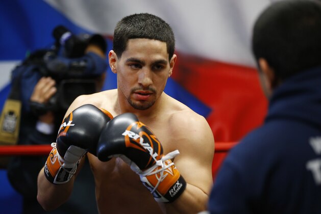 Danny Garcia spars during a media workout, Wednesday, Feb. 26, 2014, in Philadelphia. Garcia is scheduled to face Mauricio Herrera on March 15 at Coliseo Ruben Rodriguez in Bayamon, Puerto Rico. (AP Photo/Matt Rourke)
