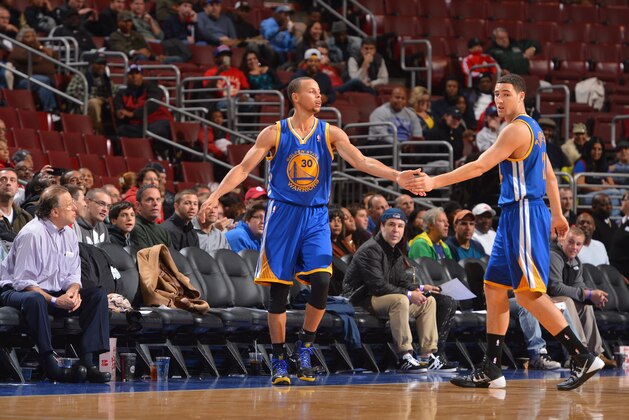 PHILADELPHIA, PA - NOVEMBER 4:  Stephen Curry #30 and Klay Thompson #11 of the Golden State Warriors celebrate against the Philadelphia 76ers at the Wells Fargo Center on November 4, 2013 in Philadelphia, Pennsylvania. NOTE TO USER: User expressly acknowledges and agrees that, by downloading and or using this photograph, User is consenting to the terms and conditions of the Getty Images License Agreement. Mandatory Copyright Notice: Copyright 2013 NBAE (Photo by Jesse D. Garrabrant/NBAE via Getty Images)