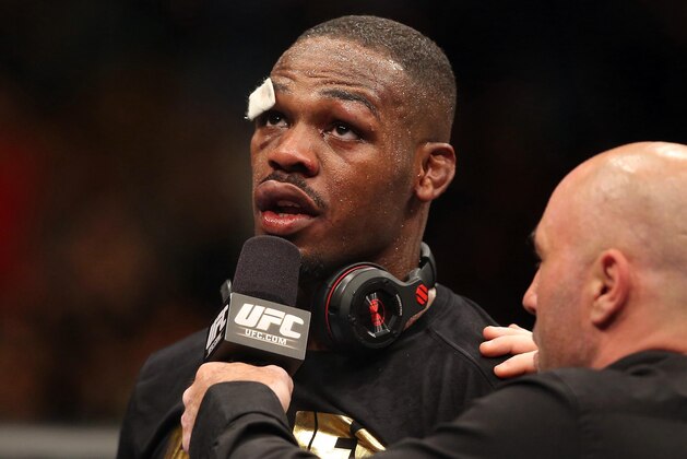 Sep 21, 2013; Toronto, Ontario, CAN; Jon Jones is interviewed by Joe Rogan after defeating Alexander Gustafsson (not pictured) during their light heavyweight championship bout at UFC 165 at the Air Canada Centre. Mandatory Credit: Tom Szczerbowski-USA TODAY Sports