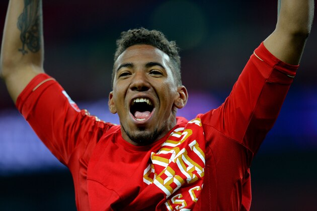 LONDON, ENGLAND - MAY 25:  Jerome Boateng of Bayern Muenchen celebrates after winning the UEFA Champions League final match against Borussia Dortmund at Wembley Stadium on May 25, 2013 in London, United Kingdom.  (Photo by Shaun Botterill/Getty Images)