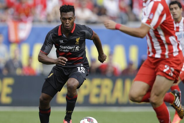 Liverpool FC forward Daniel Sturridge (15) looks to a pass against the Olympiacos during the first half of International Champions Cup soccer match in Chicago, Sunday, July 27, 2014. The Liverpool FC won 1-0. (AP Photo/Nam Y. Huh)