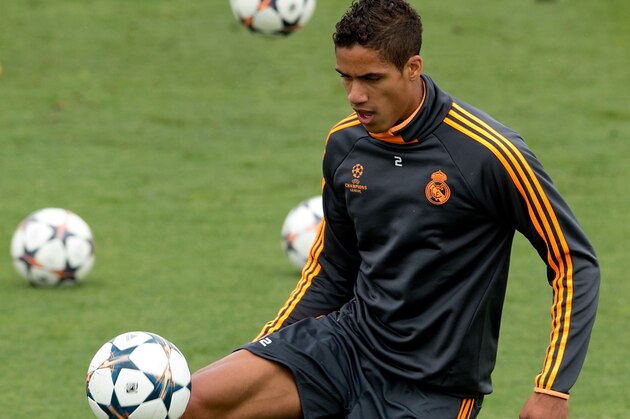 MADRID, SPAIN - MAY 20: Raphael Varane of Real Madrid CF controls the ball during the training session held the Real Madrid media day, prior to UEFA Champions League final against Club Atletico de Madrid, at Valdebebas Sport City on May 20, 2014 in Madrid, Spain.  (Photo by Gonzalo Arroyo Moreno/Getty Images)