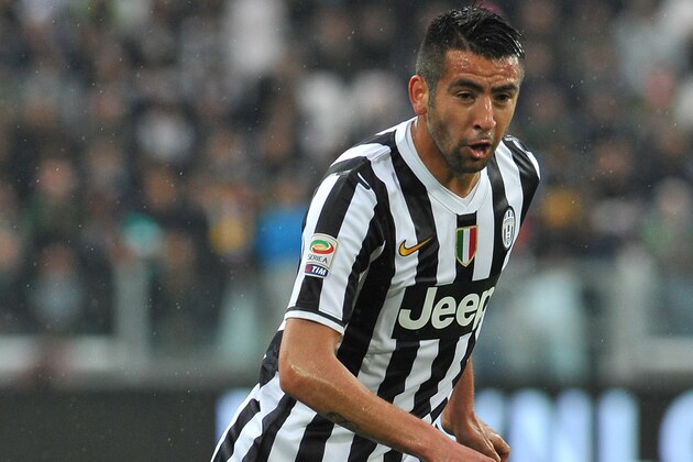 TURIN, ITALY - APRIL 19:  Mauricio Isla of Juventus in action during the Serie A match between Juventus and Bologna FC at Juventus Arena on April 19, 2014 in Turin, Italy.  (Photo by Valerio Pennicino/Getty Images)