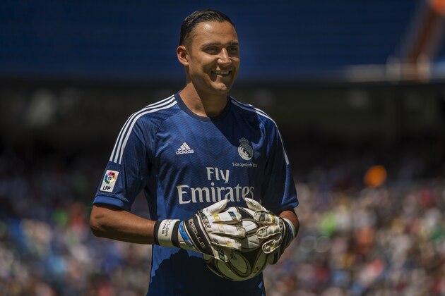 Costa Rica international soccer player Keylor Navas poses during his official presentation at the Santiago Bernabeu stadium in Madrid, Spain, Tuesday, Aug. 5, 2014, after signing for Real Madrid. (AP Photo/Andres Kudacki)