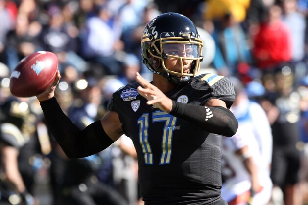 UCLA quarterback Brett Hundley throws a pass against Virginia Tech during the Sun Bowl NCAA college football game on Tuesday Dec. 31, 2013. (AP Photo/Victor Calzada)