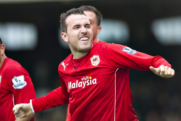 Cardiff City's Jordon Mutch celebrates after scoring against Fulham during their English Premier League soccer match at Craven Cottage stadium, in London, Saturday, Sept. 28, 2013. (AP Photo/Bogdan Maran)