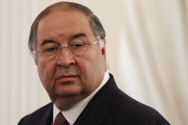 Uzbek-born Russian businessman Alisher Usmanov attends the meeting of Russian President Vladimir Putin and Crown Prince Sheik Mohammed bin Zayed Al Nahyan of the United Arab Emirates at the Novo-Ogaryovo state residence outside Moscow, on Thursday, Sept. 12, 2013. (AP Photo/Maxim Shemetov) Uzbek-born Russian businessman Alisher Usmanov attends the meeting of Russian President Vladimir Putin and Crown Prince Sheik Mohammed bin Zayed Al Nahyan of the United Arab Emirates at the Novo-Ogaryovo state residence outside Moscow, on Thursday, Sept. 12, 2013. (AP Photo/Maxim Shemetov)