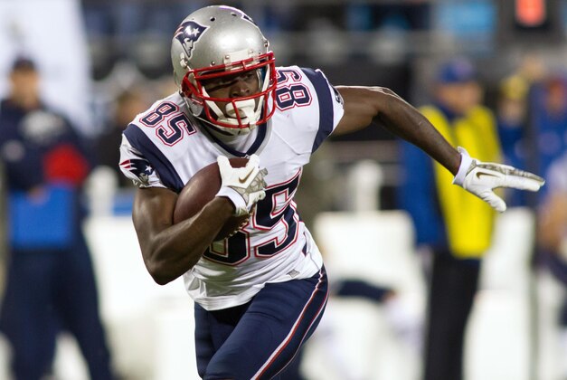 Nov 18, 2013; Charlotte, NC, USA; New England Patriots wide receiver Kenbrell Thompkins (85) runs after catching a pass during the fourth quarter against the Carolina Panthers at Bank of America Stadium. The Panthers defeated the Patriots 24-20. Mandatory Credit: Jeremy Brevard-USA TODAY Sports
