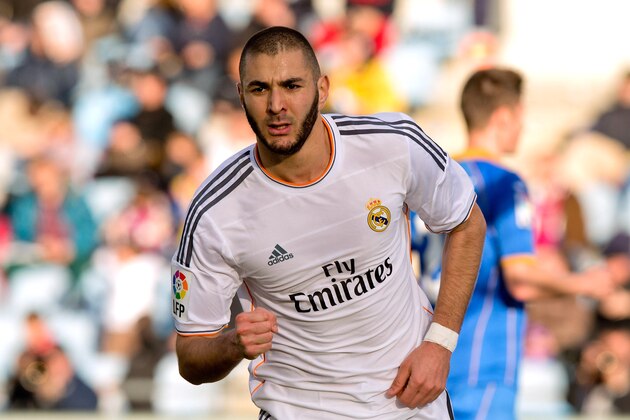 GETAFE, SPAIN - FEBRUARY 16:  Karim Benzema of Real Madrid CF celebrates scoring their second goal during the La Liga match between Getafe CF and Real Madrid CF at Coliseum Alfonso Perez on February 16, 2014 in Getafe, Spain.  (Photo by Gonzalo Arroyo Moreno/Getty Images)