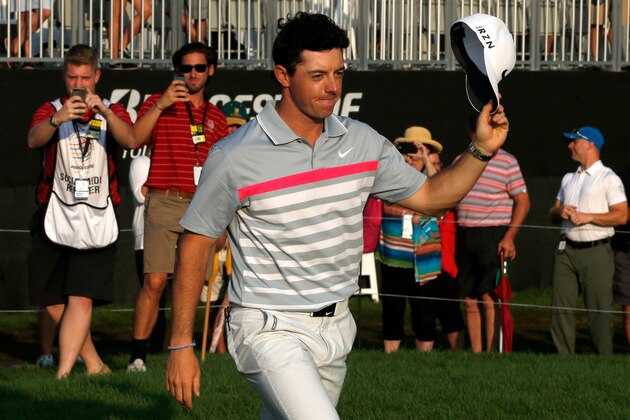 AKRON, OH - AUGUST 03:  Rory McIlroy of Northern Ireland celebrates after winning the World Golf Championships-Bridgestone Invitational with a score of -15 during the final round at Firestone Country Club South Course on August 3, 2014 in Akron, Ohio.  (Photo by Gregory Shamus/Getty Images)
