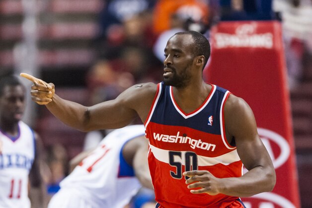Jan 30, 2013; Philadelphia, PA, USA; Washington Wizards center Emeka Okafor (50) celebrates scoring during the first quarter against the Philadelphia 76ers at the Wells Fargo Center. Mandatory Credit: Howard Smith-USA TODAY Sports