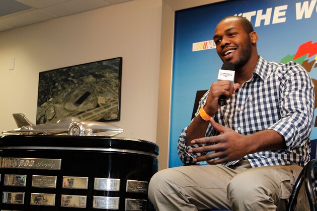 DAYTONA BEACH, FL - FEBRUARY 26:  UFC fighter Jon Jones speaks to the media prior to the start of the NASCAR Sprint Cup Series Daytona 500 at Daytona International Speedway on February 26, 2012 in Daytona Beach, Florida.  (Photo by Jonathan Ferrey/Getty Images for NASCAR)