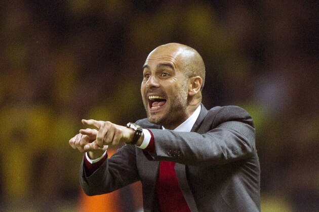 Bayern head coach Pep Guardiola of Spain gestures during the German Soccer Cup Final between FC Bayern Munich and Borussia Dortmund at the Olympic Stadium in Berlin, Germany, Saturday, May 17, 2014. (AP Photo/Gero Breloer) Bayern head coach Pep Guardiola of Spain gestures during the German Soccer Cup Final between FC Bayern Munich and Borussia Dortmund at the Olympic Stadium in Berlin, Germany, Saturday, May 17, 2014. (AP Photo/Gero Breloer)