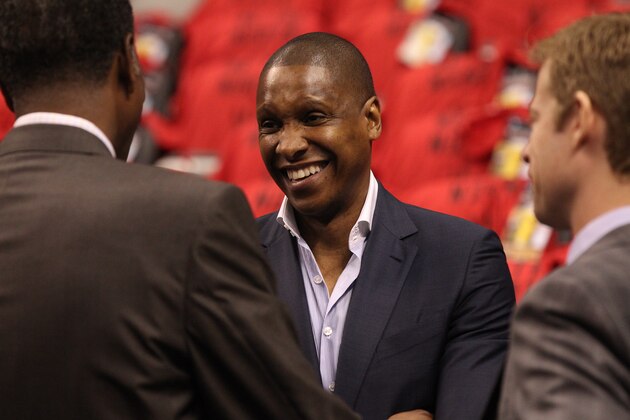 TORONTO,ON - MAY 4: General manager Masai Ujiri of the Toronto Raptors speaks with colleagues before Game seven of the Quarterfinal NBA Eastern Conference playoff game against the Brooklyn Nets at the Air Canada Centre on May 4, 2014 in Toronto, Ontario, Canada. NOTE TO USER: User expressly acknowledges and agrees that, by downloading and/or using this photograph, user is consenting to the terms and conditions of the Getty Images License Agreement. Mandatory Copyright Notice: Copyright 2014 NBAE (Photo by Dave Sandford/NBAE via Getty Images)