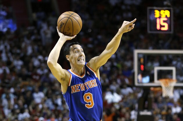 New York Knicks guard Pablo Prigioni of Argentina, calls out to a player during the second half of an NBA basketball game against the Miami Heat, Sunday, April 6, 2014 in Miami. The Heat defeated the Knicks 102-91. (AP Photo/Wilfredo Lee)