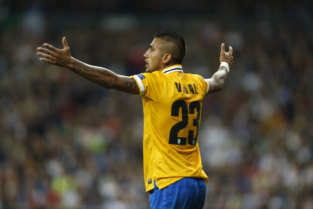 Juventus' Arturo Vidal reacts during a Group B Champions League soccer match between Real Madrid and Juventus at the Santiago Bernabeu stadium in Madrid, Spain, Wednesday Oct. 23, 2013. (AP Photo/Andres Kudacki)