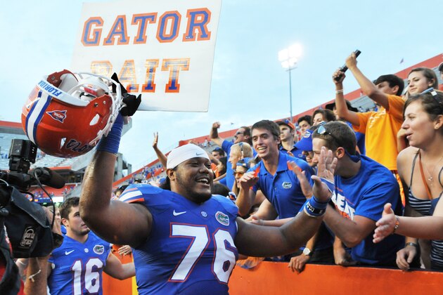 GAINESVILLE, FL - SEPTEMBER 21: Ofensive lineman Max Garcia #76 of the Florida Gators celebrates with fans after a 31- 17 victory against the Tennessee Volunteers  September 21, 2013 at Ben Hill Griffin Stadium at Florida Field in Gainesville, Florida.  (Photo by Al Messerschmidt/Getty Images)