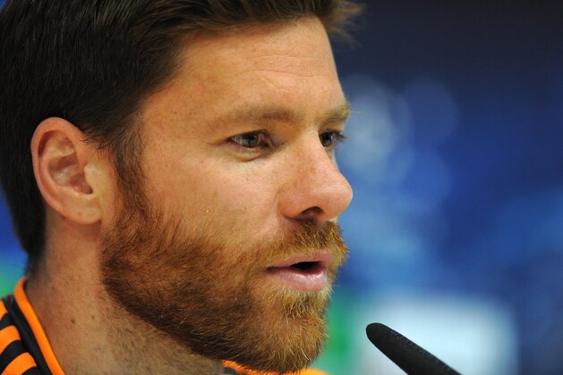MADRID, SPAIN - APRIL 22: Xabi Alonso of Real Madrid CF answers a question during their press conference at Valdebebas training ground ahead of the UEFA Champions League semi-final first leg match against Bayern Munich on April 22, 2014 in Madrid, Spain. (Photo by Denis Doyle/Getty Images) MADRID, SPAIN - APRIL 22: Xabi Alonso of Real Madrid CF answers a question during their press conference at Valdebebas training ground ahead of the UEFA Champions League semi-final first leg match against Bayern Munich on April 22, 2014 in Madrid, Spain. (Photo by Denis Doyle/Getty Images)