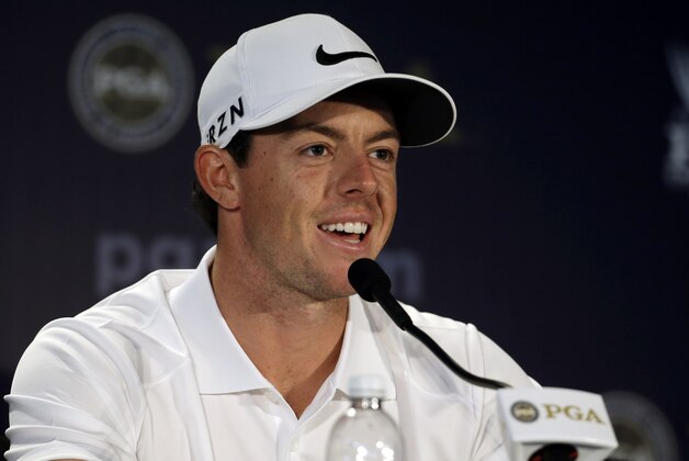Rory McIlroy, of Northern Ireland, speaks to the media during a news conference before a practice round for the PGA Championship golf tournament at Valhalla Golf Club on Tuesday, Aug. 5, 2014, in Louisville, Ky. The tournament is set to begin on Thursday. (AP Photo/Jeff Roberson)
