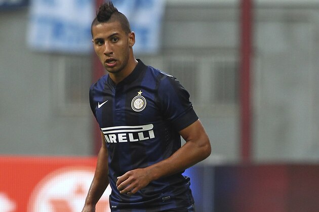 MILAN, ITALY - SEPTEMBER 14:  Saphir Sliti Taider of FC Internazionale Milano in action during the Serie A match between FC Internazionale Milano and Juventus FC at San Siro Stadium on September 14, 2013 in Milan, Italy.  (Photo by Marco Luzzani/Getty Images)