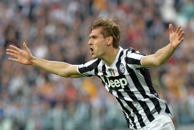 Juventus forward Fernando Llorente, of Spain, celebrates after scoring during a Serie A soccer match between Juventus and Livorno at the Juventus stadium, in Turin, Italy, Monday, April 7, 2014. (AP Photo/Massimo Pinca)