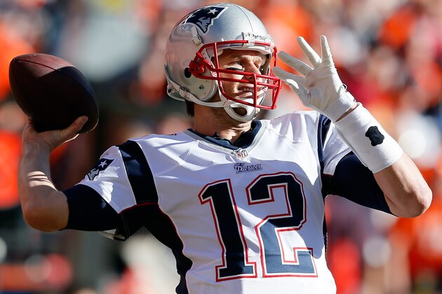 DENVER, CO - JANUARY 19:  Tom Brady #12 of the New England Patriots in action against the Denver Broncos during the AFC Championship game at Sports Authority Field at Mile High on January 19, 2014 in Denver, Colorado.  (Photo by Kevin C. Cox/Getty Images)