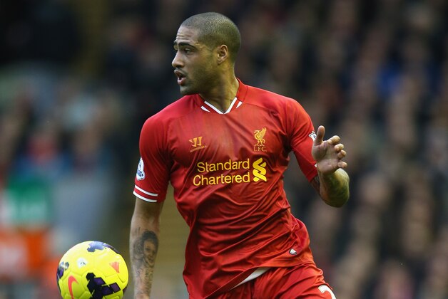 LIVERPOOL, ENGLAND - FEBRUARY 23:  Glen Johnson of Liverpool in action during the Barclays Premier League match between Liverpool and Swansea City at Anfield on February 23, 2014 in Liverpool, England.  (Photo by Clive Brunskill/Getty Images)