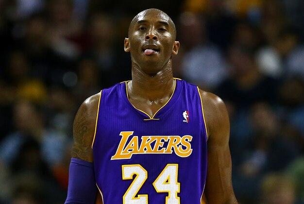 CHARLOTTE, NC - DECEMBER 14:  Kobe Bryant #24 of the Los Angeles Lakers during their game at Time Warner Cable Arena on December 14, 2013 in Charlotte, North Carolina.  NOTE TO USER: User expressly acknowledges and agrees that, by downloading and or using this photograph, User is consenting to the terms and conditions of the Getty Images License Agreement.  (Photo by Streeter Lecka/Getty Images)