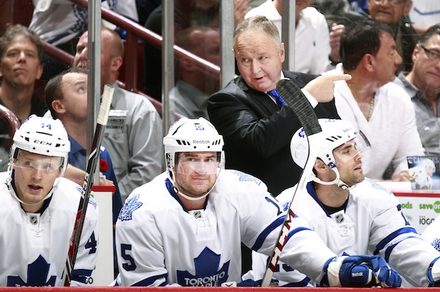 VANCOUVER, BC - NOVEMBER 2:  Head coach Randy Carlyle looks on from the bench during their NHL game against the Vancouver Canucks at Rogers Arena on November 2, 2013 in Vancouver, British Columbia, Canada. Vancouver won 4-0. (Photo by Jeff Vinnick/NHLI via Getty Images)