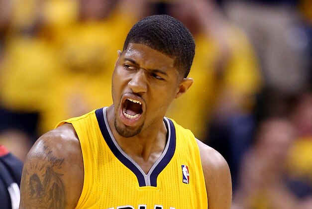 INDIANAPOLIS, IN - MAY 20:  Paul George #24 of the Indiana Pacers reacts against the Miami Heat during Game Two of the Eastern Conference Finals of the 2014 NBA Playoffs at at Bankers Life Fieldhouse on May 20, 2014 in Indianapolis, Indiana. NOTE TO USER: User expressly acknowledges and agrees that, by downloading and or using this photograph, User is consenting to the terms and conditions of the Getty Images License Agreement.  (Photo by Andy Lyons/Getty Images)