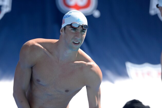 IRVINE, CA - AUGUST 06: Michael Phelps prepares for his race in the Men's 100 Meter Freestyle Prelims during the 2014 Phillips 66 National Championships at the Woollett Aquatic Center on August 6, 2014 in Irvine, California. (Photo by Harry How/Getty Images) IRVINE, CA - AUGUST 06: Michael Phelps prepares for his race in the Men's 100 Meter Freestyle Prelims during the 2014 Phillips 66 National Championships at the Woollett Aquatic Center on August 6, 2014 in Irvine, California. (Photo by Harry How/Getty Images)