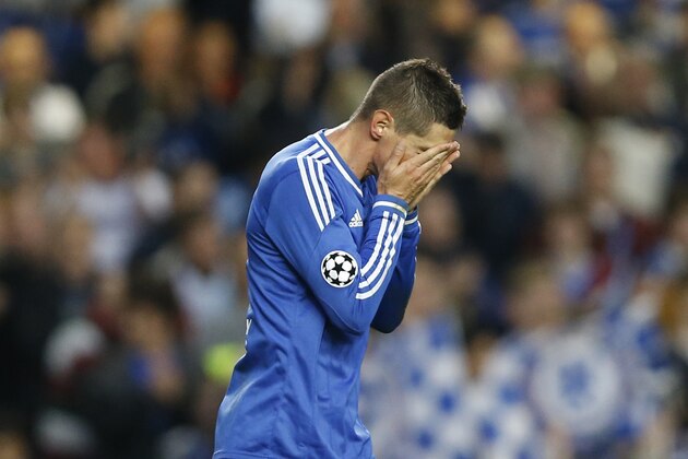 Chelsea's Fernando Torres reacts after he scored against his old club during the Champions League semifinal second leg soccer match between Chelsea and Atletico Madrid at Stamford Bridge Stadium in London Wednesday, April 30, 2014. (AP Photo/Kirsty Wigglesworth)