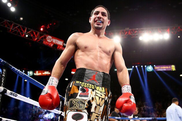 LAS VEGAS, NV - SEPTEMBER 14:  Danny Garcia celebrates after the 12th round against Lucas Matthysse in their WBC/WBA super lightweight title fight at the MGM Grand Garden Arena on September 14, 2013 in Las Vegas, Nevada.  (Photo by Al Bello/Getty Images)