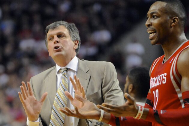 Houston Rockets' head coach Kevin McHale, with Dwight Howard (12) react to a call during game four of an NBA basketball first-round playoff series game with the Portland Trail Blazers in Portland, Ore., Sunday April 27, 2014. (AP Photo/Greg Wahl-Stephens)