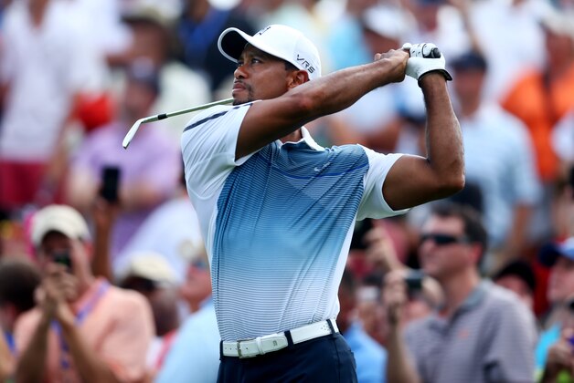 LOUISVILLE, KY - AUGUST 06: Tiger Woods of the United States hits a tee shot during a practice round prior to the start of the 96th PGA Championship at Valhalla Golf Club on August 6, 2014 in Louisville, Kentucky.  (Photo by Jeff Gross/Getty Images)