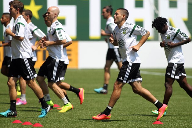 Aug 5, 2014; Portland, OR, USA; Clint Dempsey (middle) of the Seattle Sounders warms up with MLS All Star teammates during a training session in advance of the 2014 MLS All Star Game at Providence Park. Mandatory Credit: Craig Mitchelldyer-USA TODAY Sports