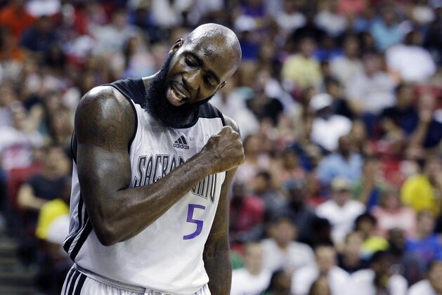 Sacramento Kings' Quincy Acy reacts after a play against the Houston Rockets during the NBA summer league championship basketball game Monday, July 21, 2014, in Las Vegas. (AP Photo/John Locher)