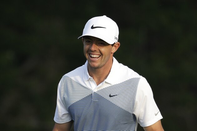 Rory McIlroy, of Northern Ireland, smiles on the seventh green during a practice round for the PGA Championship golf tournament at Valhalla Golf Club on Wednesday, Aug. 6, 2014, in Louisville, Ky. The tournament is set to begin on Thursday. (AP Photo/David J. Phillip)