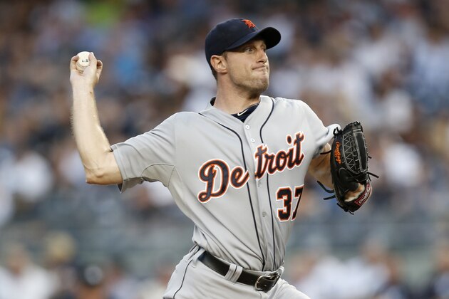Detroit Tigers starting pitcher Max Scherzer delivers in a baseball game against the New York Yankees at Yankee Stadium in New York, Monday, Aug. 4, 2014.  (AP Photo/Kathy Willens)