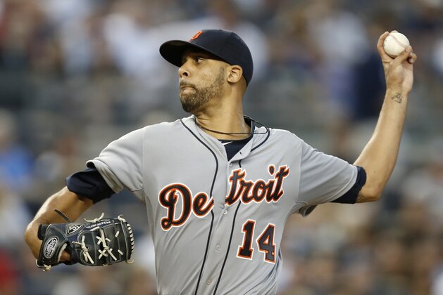 Making his Tigers pitching debut, Detroit Tigers starting pitcher David Price delivers in the second inning of a baseball game against the New York Yankees at Yankee Stadium in New York, Tuesday, Aug. 5, 2014.  (AP Photo/Kathy Willens)