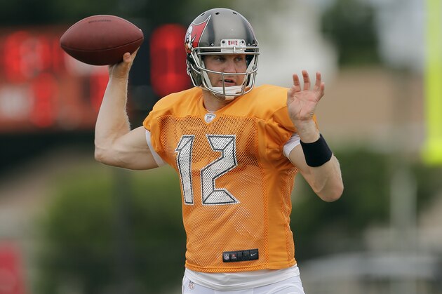 Tampa Bay Buccaneers quarterback Josh McCown throws a pass during an NFL football training camp Monday, Aug. 4, 2014, in Tampa, Fla. (AP Photo/Chris O'Meara)