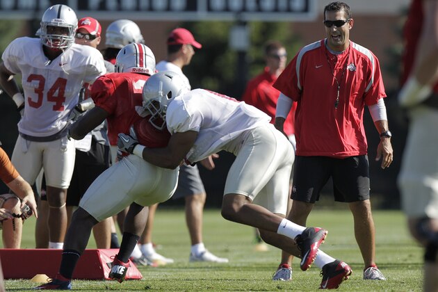 Ohio State's defensive coordinator Luke Fickell in action during NCAA college football practice Tuesday, Aug. 7, 2012, in Columbus, Ohio. (AP Photo/Jay LaPrete) Ohio State's defensive coordinator Luke Fickell in action during NCAA college football practice Tuesday, Aug. 7, 2012, in Columbus, Ohio. (AP Photo/Jay LaPrete)