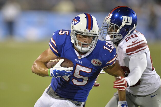 Buffalo Bills wide receiver Chris Hogan (15) runs from New York Giants cornerback Jayron Hosley (28) after a catch during the Pro Football Hall of Fame exhibition NFL football game Sunday, Aug. 3, 2014, in Canton, Ohio. New York won 17-13. (AP Photo/David Richard) Buffalo Bills wide receiver Chris Hogan (15) runs from New York Giants cornerback Jayron Hosley (28) after a catch during the Pro Football Hall of Fame exhibition NFL football game Sunday, Aug. 3, 2014, in Canton, Ohio. New York won 17-13. (AP Photo/David Richard)